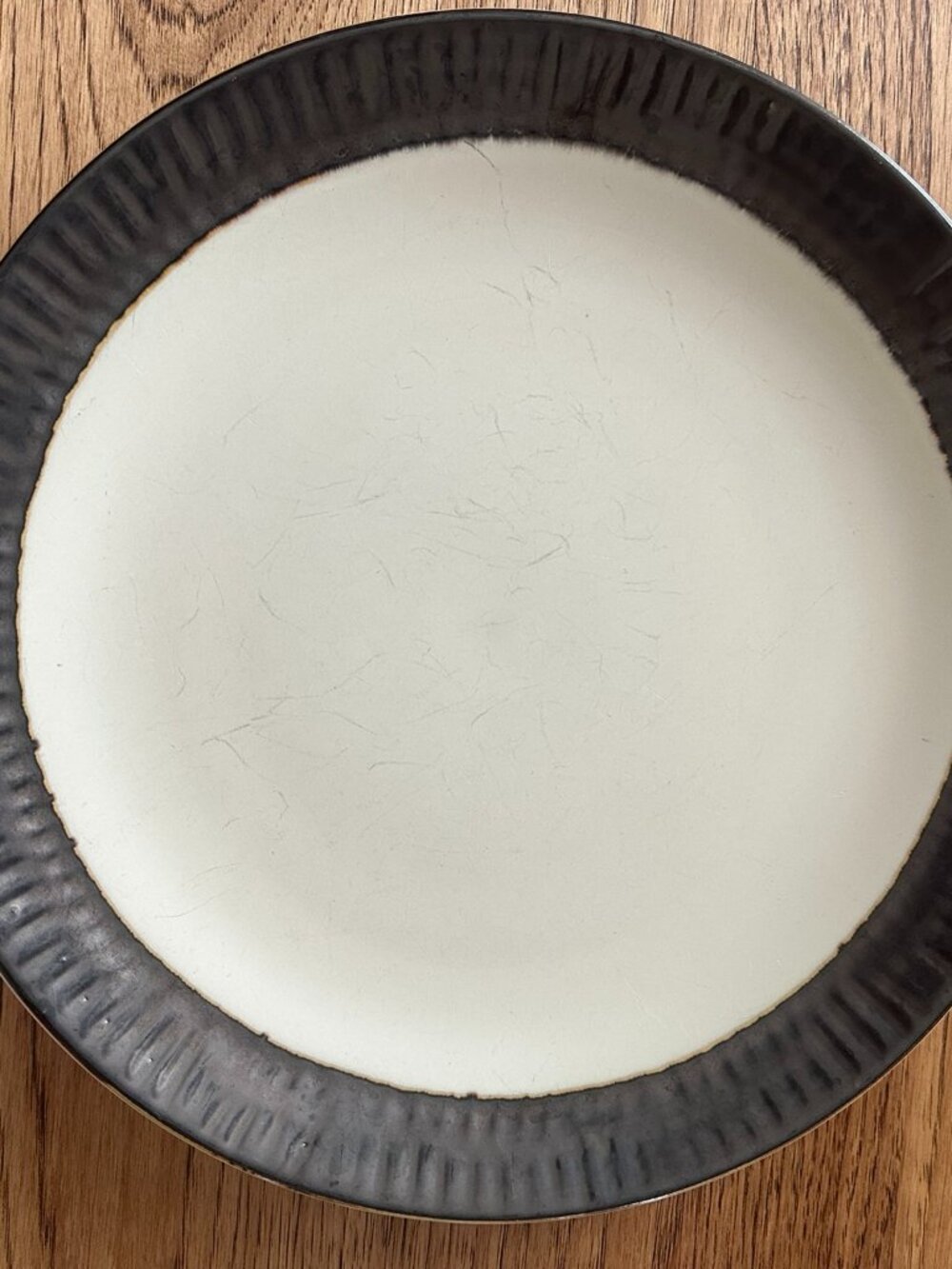Crate & Barrel SCAVO Embossed Brown Border Cream Center 11 1/4" Dinner Plate